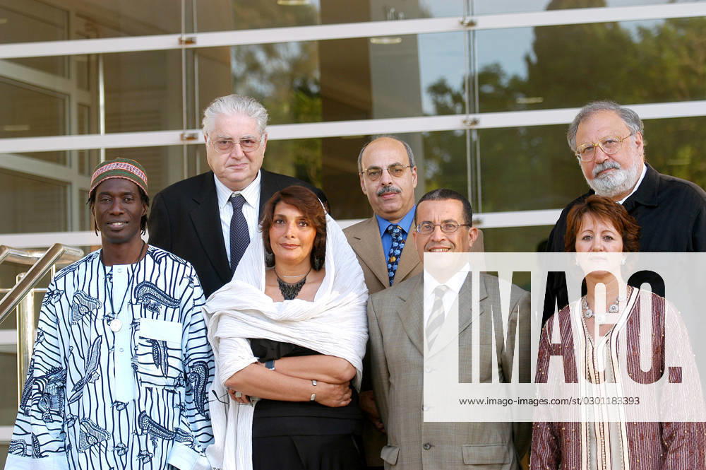 66752 01 Jury members of the Assilah first South-South Film Encounter that gathered some 35 directors from various countries, pose in Assilah on 29 July 2004. From Left : Makena Diop from Senegal, Moritz de Hadeln from Switzerland, Manijeh Hekmat from Iran, Ali Abou Shadi from Egypt, Mohammed Bakri and Soumaya Naamane Guessous from Morocco and Rustam Ibragimbekov from Azerbaidjan. Photo by Ammar Abd Rabbo ABACA.