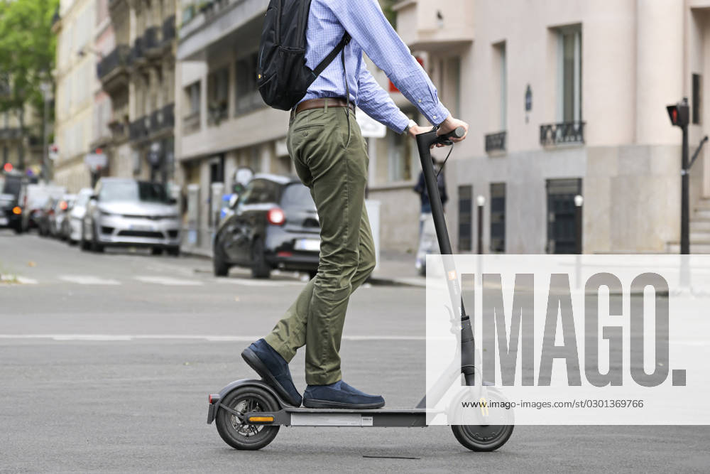 End Of Self-Service Scooters In Paris From September 1 Illustration picture shows people using a self-service electric scooter in streets of Paris, France on August 8, 2023. All self-service e-scooters will come to a stop in Paris as of 1 September after a referendum. Photo by Victor Joly ABACAPRESS.COM Paris France