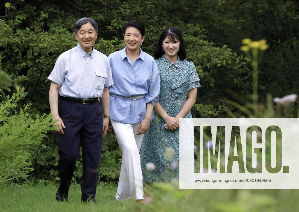 Japan imperial family on summer vacation (from L) Japanese Emperor Naruhito, Empress Masako and their daughter Princess Aiko take a stroll on the premises of an imperial villa in Nasushiobara in Tochigi Prefecture, north of Tokyo, on Aug. 21, 2023, as they stay there for their summer vacation, the first time in four years after the novel coronavirus pandemic. (Pool photo) A14AA0001780937P