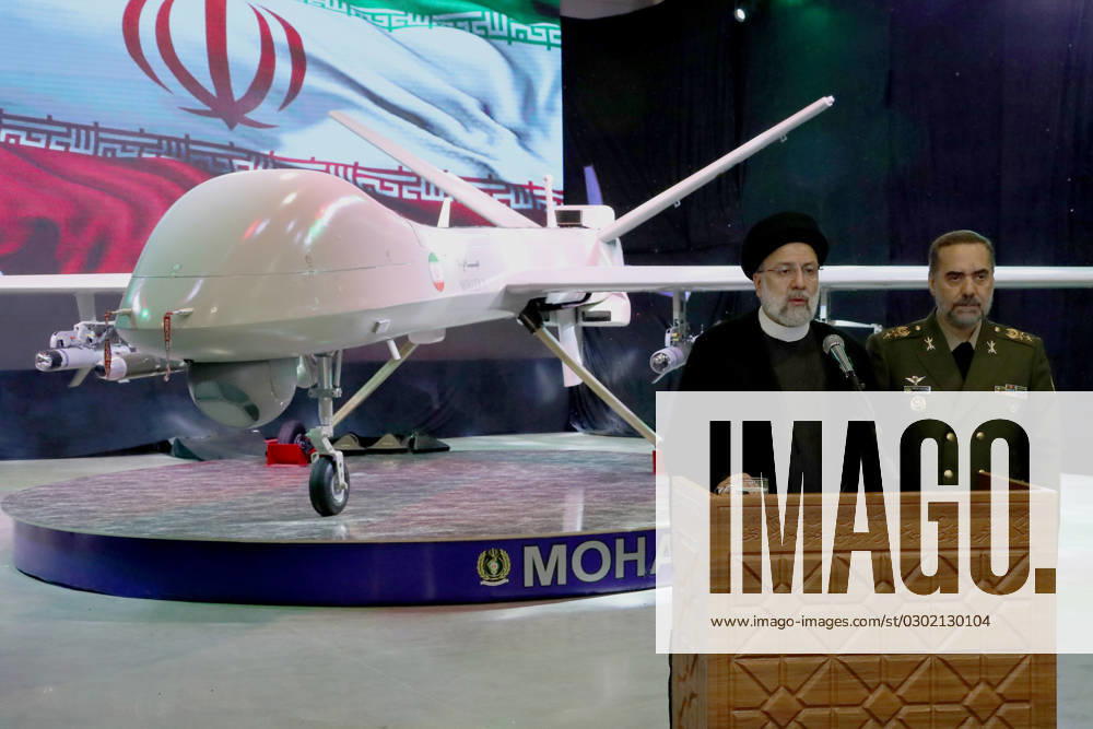 undisclosed, Iran: Iranian President EBRAHIM RAISI (L) and his Defense Minister MOHAMMAD REZA GHARAEI ASHTIANI (R) during the unveiling ceremony of the new drone Mohajer 10 . Iran s Defense Ministry unveiled a drone resembling America s armed MQ-9 Reaper, claiming that the aircraft capable of staying airborne for 24 hours and having the range to reach its archenemy Israel. The latest version of the domestically-built Mohajer drone has a higher flight duration, speed, and payload. Also, some new ballistic missiles have joined the Iranian Armed Forces. undisclosed Iran - ZUMAi98_ 20230823_zih_i98_040