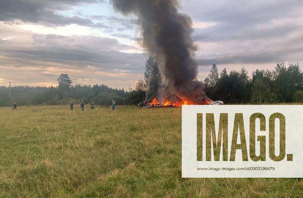 A still image posted on a Wagner linked Telegram channel @grey_zone on August 23, 2023, shows rescuers work at the site of a plane crash near the village of Kuzhenkino, Tver region, Russia on August 23, 2023.. Russian Ministry of Emergency Situations said on Wednesday that a private plane crashed in Tver region, killing all 10 people aboard, while the Russian Federal Air Transport Agency, Rosaviatsia, said that Wagner chief Yevgeny Prigozhin was on the list of passengers. RUSS2023082302 Gray_Zone
