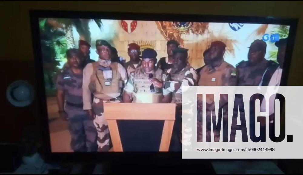 Gabun, Militär-Putsch - Militär verkündet im TV die Machtübernahme (230830) -- LIBREVILLE, Aug. 30, 2023 -- This video grab shows a group of Gabonese military officers releasing a statement via a TV channel in the early morning of Aug. 30, 2023. Gabonese military officers have canceled election results and dissolved state institutions, claiming they have taken power, local media reported on Wednesday. The African country s borders are closed until further notice, said the reports, adding gunfire was heard in the capital Libreville. The officers said that the general election was not credible and the results are annulled. Prior to the incident, Gabon s national electoral body said that President Ali Bongo Ondimba from the ruling Gabonese Democratic Party was re-elected for a third term in Saturday