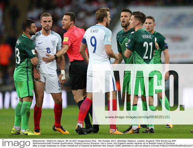 5th October 2017, Wembley Stadium, London, England; FIFA World Cup WM Weltmeisterschaft Fussball Qualification, England versus Slovenia; Harry Kane, the England captain squares up to Bostjan Cesar of Slovenia after a rough challenge on Jordan Henderson of England as Referee Felix Zwayer (GER) attempts to calm all players involved ActionPlus11937827