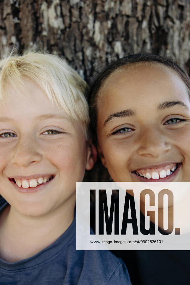 Portrait of happy multiracial male and female friends at summer camp Sweden, Stockholm, model released