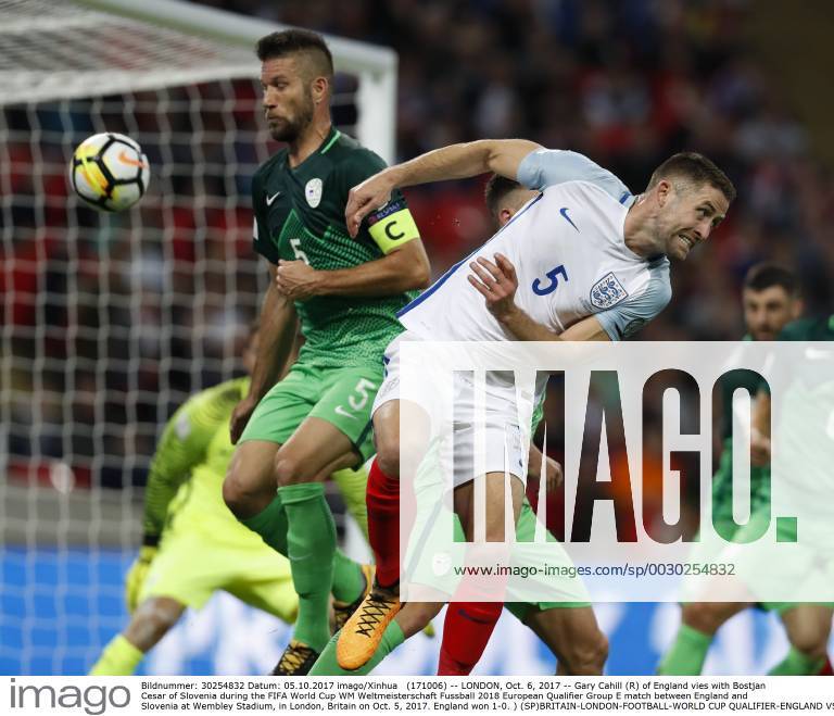 (171006) -- LONDON, Oct. 6, 2017 -- Gary Cahill (R) of England vies with Bostjan Cesar of Slovenia during the FIFA World Cup WM Weltmeisterschaft Fussball 2018 European Qualifier Group E match between England and Slovenia at Wembley Stadium, in London, Britain on Oct. 5, 2017. England won 1-0. ) (SP)BRITAIN-LONDON-FOOTBALL-WORLD CUP QUALIFIER-ENGLAND VS SLOVENIA HanxYan