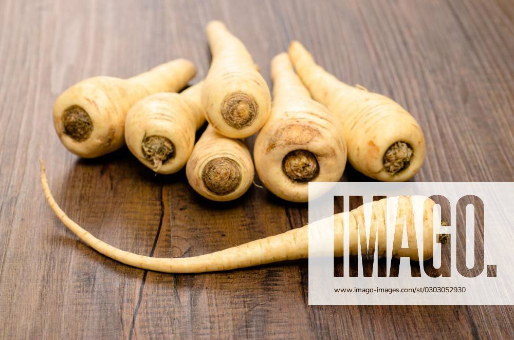 Vegetable parsnips, A stack of vegetable parsnips on a table, A stack of vegetable parsnips on a table, 27.12.2013,