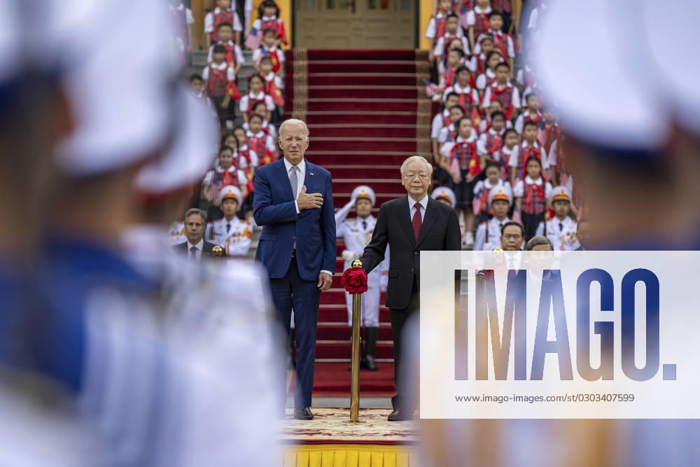 U.S. President Joe Biden, left, stands with Vietnamese General Secretary of the Communist Party Nguyen Phu Trong, right, on the podium during the official welcoming ceremony at the Presidential Palace, September 10, 2023 in Hanoi, Vietnam. Hanoi Vietnam - ZUMAp138 20230910_zaa_p138_033