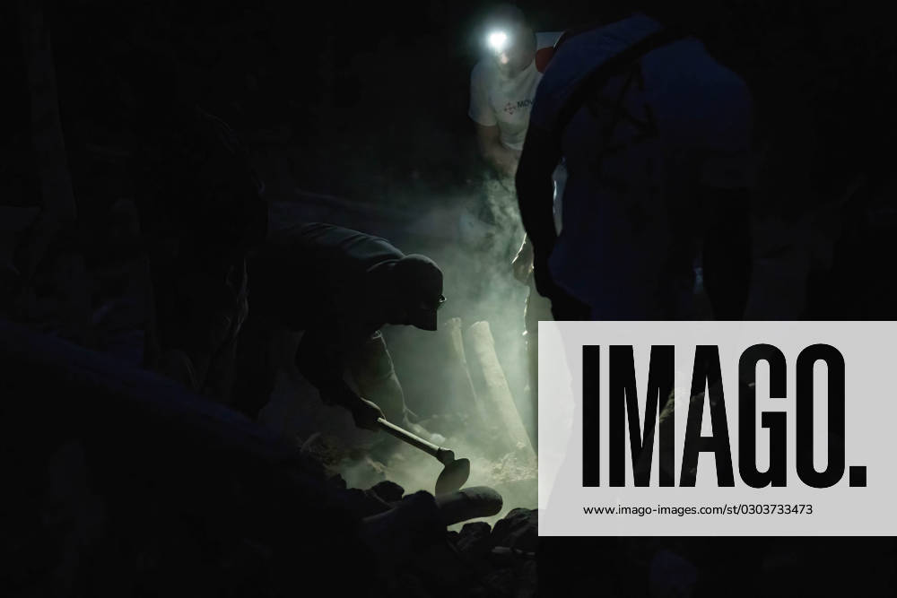 Rescuers dig through rubble at night in search of a possible 17-year-old survivor in Imi N Tala. A village turned into a cemetery; at least 90 per cent of the population of Imi N Tala was killed by the severe earthquake on Friday 8 September. A village turned into a cemetery, and 90 per cent of the population of Imi N Tala were killed by the severe earthquake on Friday 8 September. Imi N Tala Morocco - ZUMAs197 20230912_aaa_s197_105