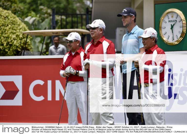- SPORT October 11, 2017 - Kuala Lumpur, Malaysia - Prime Minister of Malaysia Najib Razak (C) and Thomas Pieters (2nd R) of Belgium pose for photo during during the PRO-AM day of the CIMB Classic 2017 at TPC Kuala Lumpur on October 11, 2017 in Kuala Lumpur, Malaysia. 2017 CIMB Classic: Pro Am - ZUMAn230 20171011_zaa_n230_154