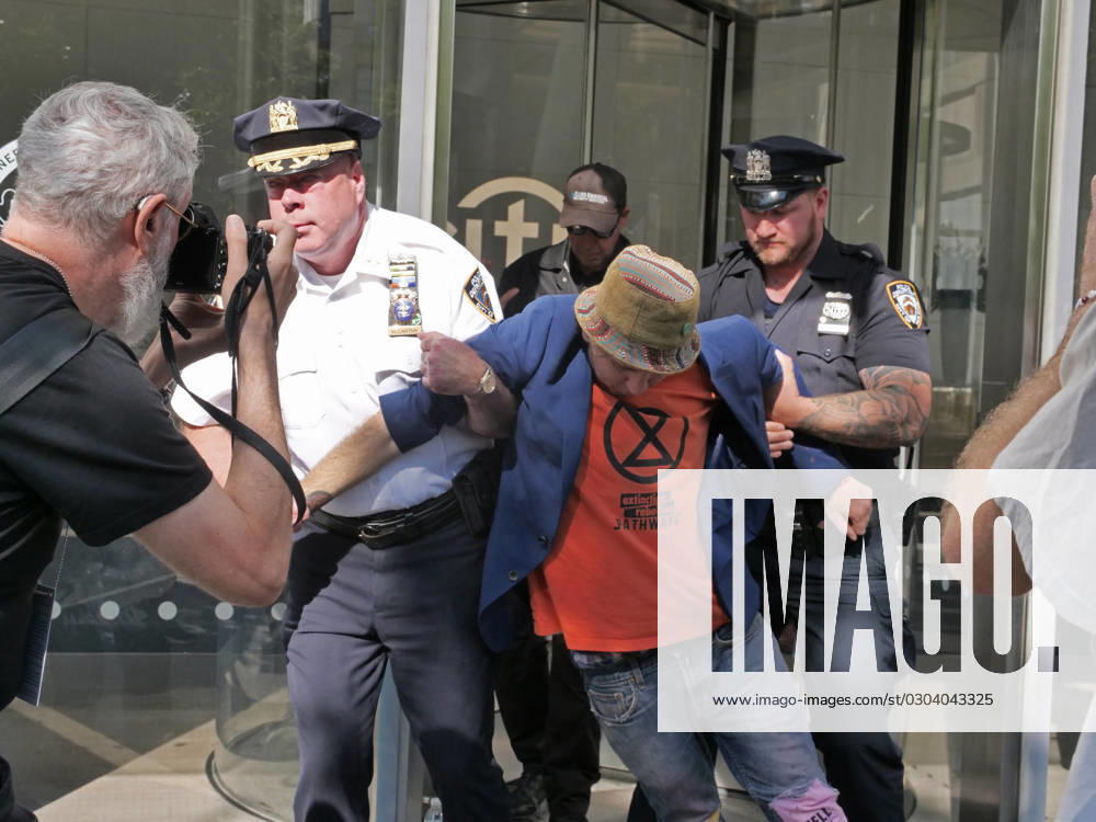 Multiple protesters were arrested during a climate demonstration at the NYC headquarters of Citi in Tribeca according to the NYPD. Dozens blocked entrances to the banking giants building on Greenwich St. in an attempt to stop the bank from investing in fossil fuels. With banners and signage they blocked Citi employees from entering their offices for an hour or so till police after warning them to disperse starting making arrests. New York US - ZUMAh156 20230914_znp_h156_008