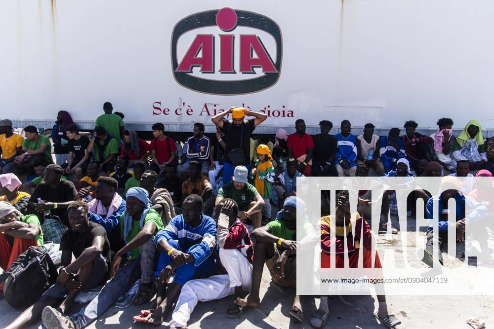 Italian authorities begin transfer of migrants from Lampedusa, Italy - 14 Sep 2023 More than 6,790 migrants were on the Italian island on 13 September after a record arrival of 6,402 people in two days. The Prefecture of Agrigento has arranged for a ferry to pick up around 700 people from Lampedusa to Porto Empedocle, while another 180 being transferred by an IOM flight. Lampedusa, Italy, 14 September 2023, Credit:Alessandro SerranÃ² Avalon Italy, Lampedusa