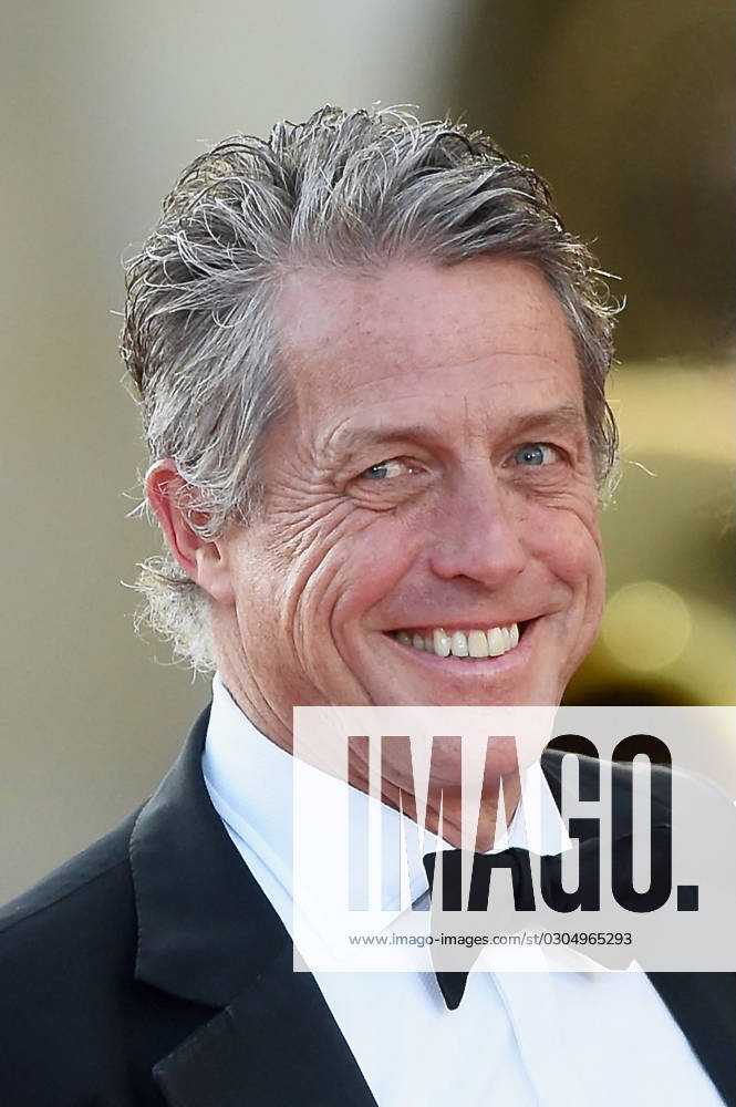King Charles Visit To France - State Banquet Arrivals Hugh Grant arriving to the state banquet at the Palace of Versailles, west of Paris, France on September 20, 2023, on the first day of British King state visit to France. Photo by Franck Castel ABACAPRESS.COM Versailles France