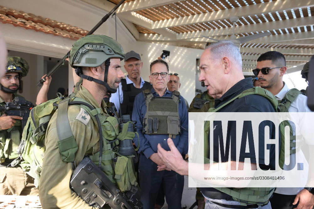 Israeli Prime Minister BENJAMIN NETANYAHU visits the Gaza border touring Kibbutz Beeri and Kibbutz Kfar Aza and viewed ruins of homes where massacres occurred. The Prime Minister met with IDF fighters in the field including Col. AMI BITTON, commanding officer of the Paratroopers 35th Brigade. Israel - ZUMAi99_ 20231014_zip_i99_002