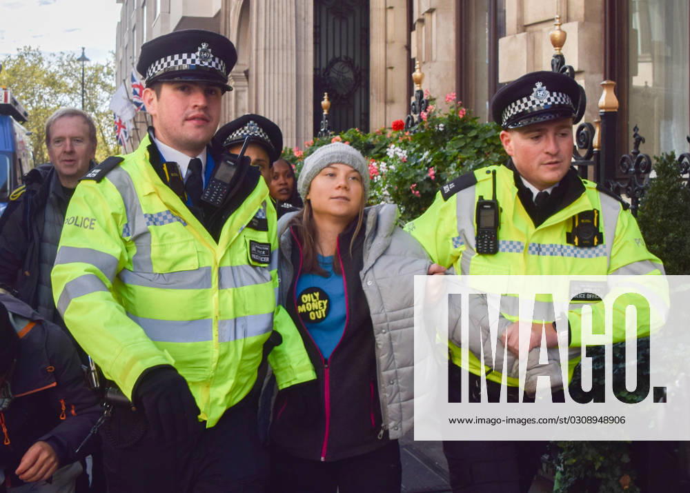 Swedish activist GRETA THUNBERG is arrested in London, as she takes part in a protest against fossil fuels outside InterContinental Hotel in Park Lane during the Energy Intelligence Forum, a summit of the biggest oil company executives. London UK - ZUMAv130 20231017_zip_v130_009
