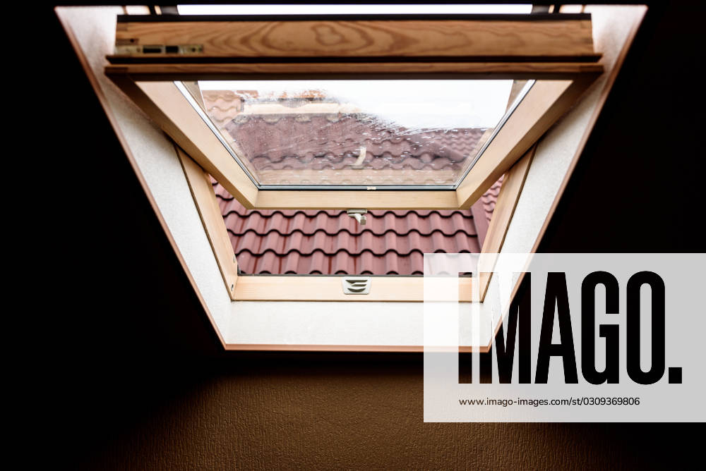 Open wooden attic window open wooden attic window overlooking the street ,model released, Symbolfoto ,property released