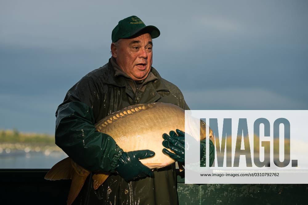 Fishermen fish out the Vrkoc pond in Nova Ves, Brno-Country District, Czech Republic, on October 28, 2023. (CTKxPhoto PatrikxUhlir) CTKPhotoP2023102802946 CTKPhotoP2023102802946