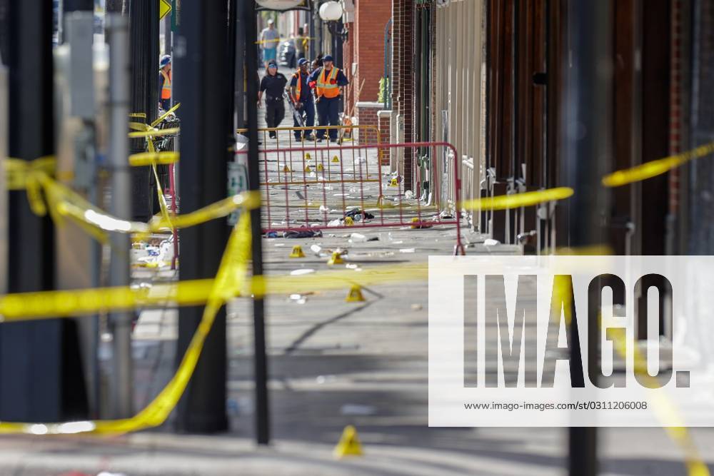 Evidence markers are seen as Tampa police investigators process the scene of a shooting that left two dead and 18 injured along 7th ave on Sunday, Oct. 29, 2023 in Ybor City. Ybor City USA - ZUMAs70_ 20231029_zan_s70_057