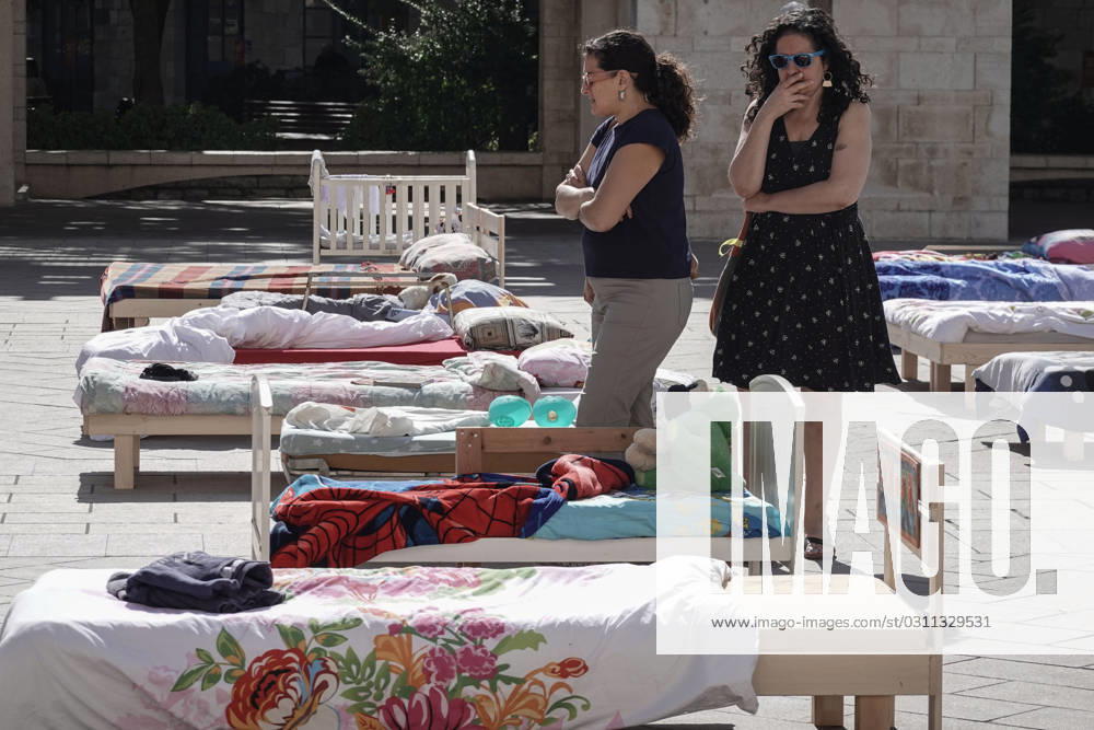 An installation at Jerusalemâ€⠢s Safra Square portrays 230 beds, empty since 7th October, 2023, in solidarity with the now estimated 230 hostages in the hands of Hamas of the Gaza Strip and their families. Israel is engaged in a war with Hamas of the Gaza Strip following massive rocket fire from the Gaza Strip into Israel, infiltration of gunmen into Israeli territory, massacre of civilian women and children in their homes and hostage taking of civilians and soldiers. 350,000 reservists have been deployed, the Israel Air Force is massively bombing Gaza and ground forces are taking part in incursions into the Gaza Strip. Jerusalem Israel - ZUMAa126 20231030_zap_a126_013