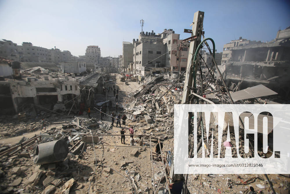 People search through buildings, destroyed during Israeli air raids on Al-Shati refugee camp in Gaza City People search through buildings, destroyed during Israeli air raids on Al-Shati refugee camp in Gaza City on November 6, 2023. The Israeli army has expanded its military assault. The Gaza strip, a besieged Palestinian territory, is under heavy bombing from Israel in response to the large-scale attack carried out on October 7 by Hamas in Israel. The international community is stepping up pressure for a humanitarian truce. Photo by Bashar Taleb apaimages Gaza city Gaza Strip Palestinian Territory 061123_Gaza_BT_00(11)