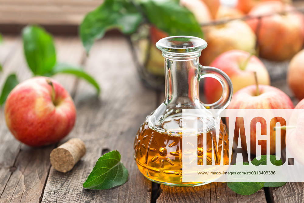 Apple vinegar , 23022786.jpg, vinegar, apple, bottle, glass, fruit, healthy, food, fresh, organic, ingredient, background, liquid, wooden, acid, cooking, dressing, table, natural, rustic, nutrition, leaf, sour, raw, cuisine, kitchen, apple vinegar, RECORD DATE NOT STATED