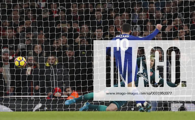 Chelsea s Eden Hazard scoring his sides opening goal during the premier league match at the Emirates Stadium, London. Picture date 3rd January 2018. Picture credit should read: David Klein Sportimage .