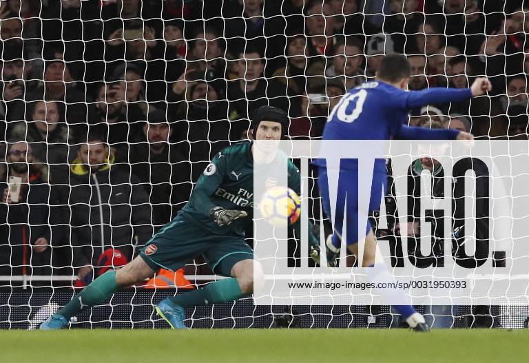 Chelsea s Eden Hazard scoring his sides opening goal during the premier league match at the Emirates Stadium, London. Picture date 3rd January 2018. Picture credit should read: David Klein Sportimage .