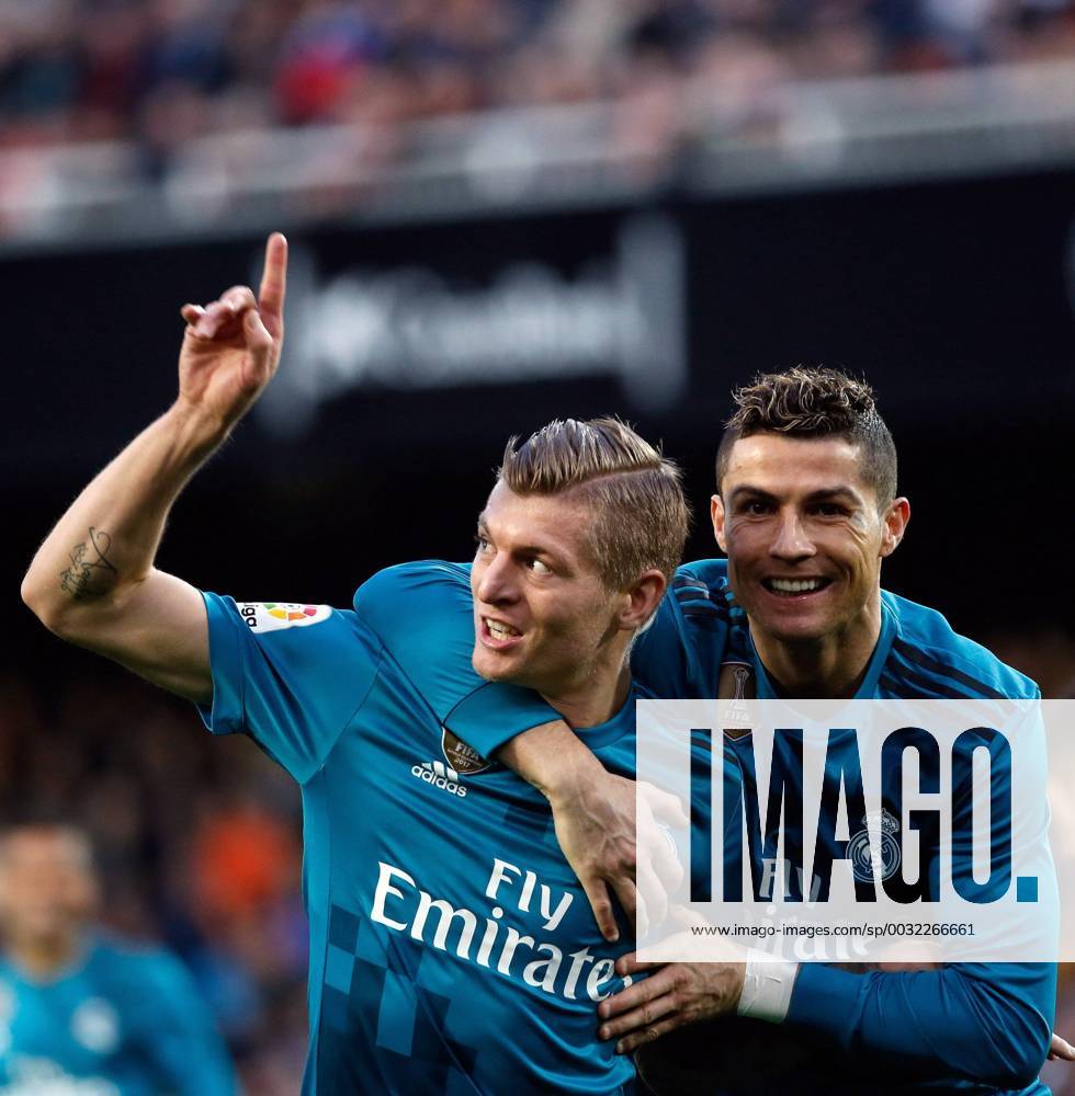 - SPORT Real Madrid s German midfielder Toni Kroos (R) celebrates with Portuguese winger Cristiano Ronaldo (R) after scoring 1-4 against Valencia during their Spanish Primera Division game at Mestalla stadium in Valencia, Spain, 27 January 2018. VALENCIA vs REAL MADRID !ACHTUNG: NUR REDAKTIONELLE NUTZUNG!