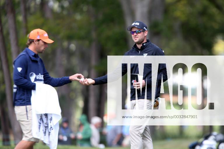 Palm Harbor, Florida, U.S. - DOUGLAS R. CLIFFORD Times .Corey Conners, right, prepares to putt at the 13th hole while playing the Copperhead Course on Thursday (3 8 18) during the first round of the Valspar Championship at the Innisbrook Golf and Spa Resort in Palm Harbor. Florida News - March 8, 2018 - ZUMAs70_ 82203485st