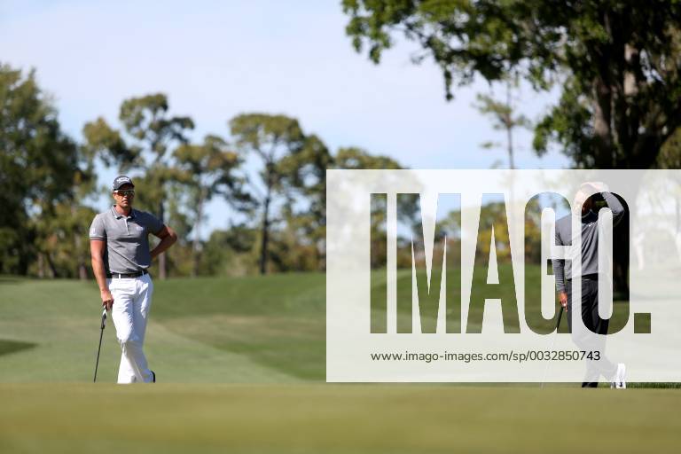Palm Harbor, Florida, U.S. - DOUGLAS R. CLIFFORD Times .Henrik Stenson, left, and Tiger Woods, rest at the 7th green while playing the Copperhead Course on Thursday (3 8 18) during the first round of the Valspar Championship at the Innisbrook Golf and Spa Resort in Palm Harbor. Golf 2018: Valspar Championship Pro-Am - ZUMAs70_ 20180308_zan_s70_054