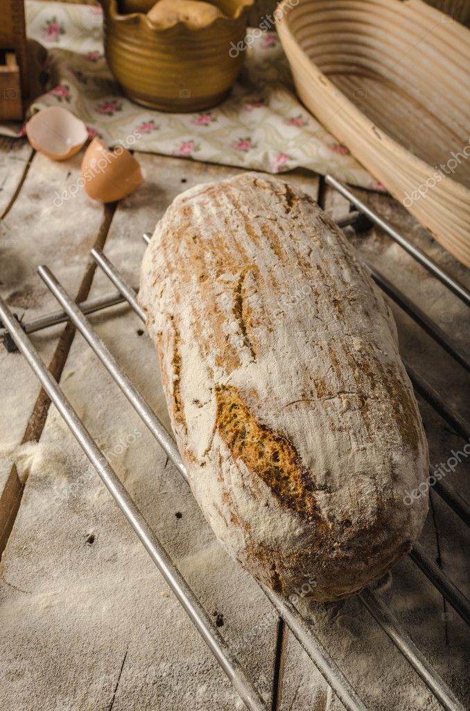 Homemade rustic bread, baked in oven, wheat leaven, breaded in a basket