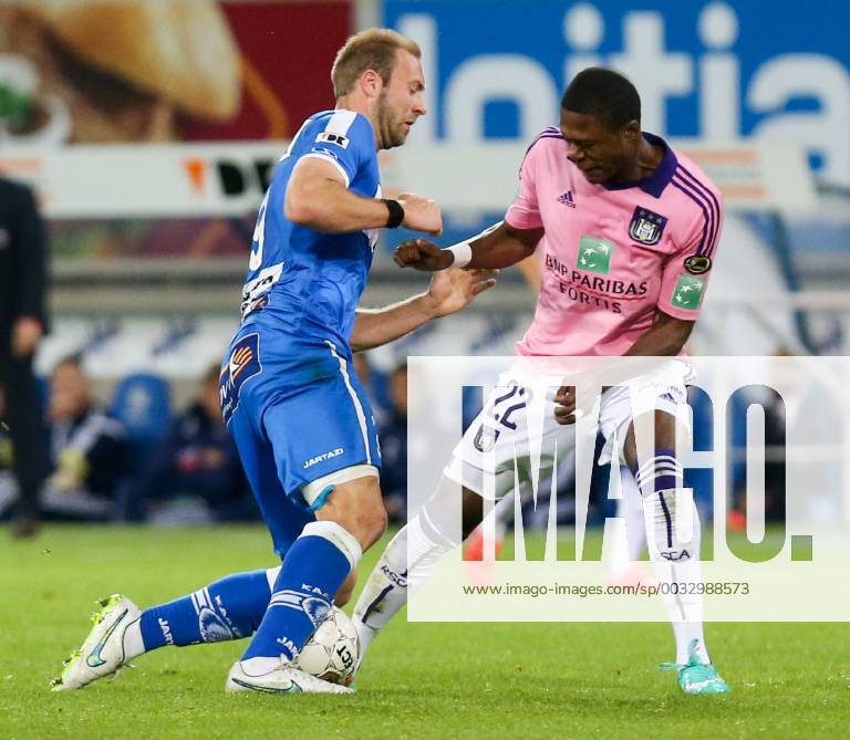 - GENT, BELGIUM: Gent s Laurent Depoitre and Anderlecht s Chancel Mbemba fight for the ball during the Jupiler Pro League match between KAA Gent and RSC Anderlecht, Thursday 30 April 2015 in Gent, on the fifth day of the Play-off 1. VIRGINIExLEFOUR x80473902x