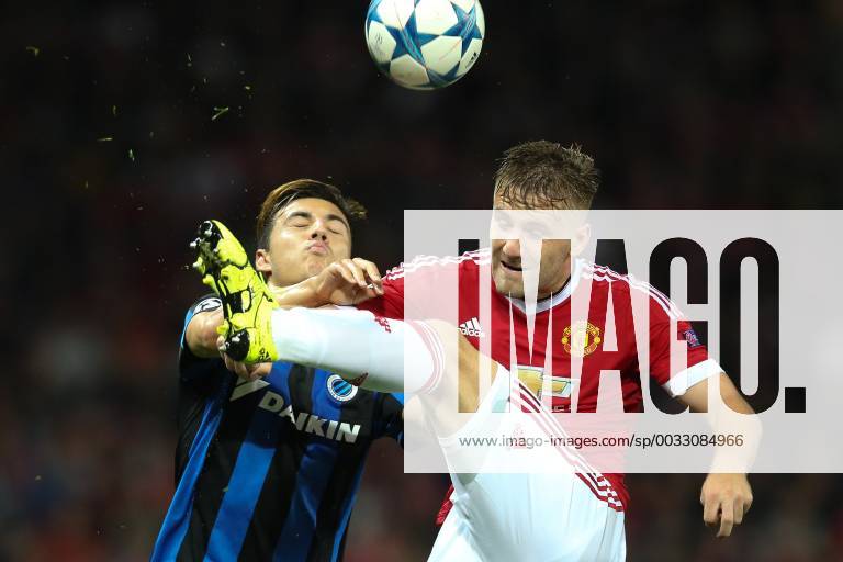 - MANCHESTER, UNITED KINGDOM: Club s Dion Cools and Manchester s Luke Shaw fight for the ball during a soccer game between British club Manchester United ManU FC and Belgian team Club Brugge KV in Manchester, United Kingdom, Tuesday 18 August 2015, the first leg of the play-offs for the UEFA Champions League competition. BRUNOxFAHY x84382391x