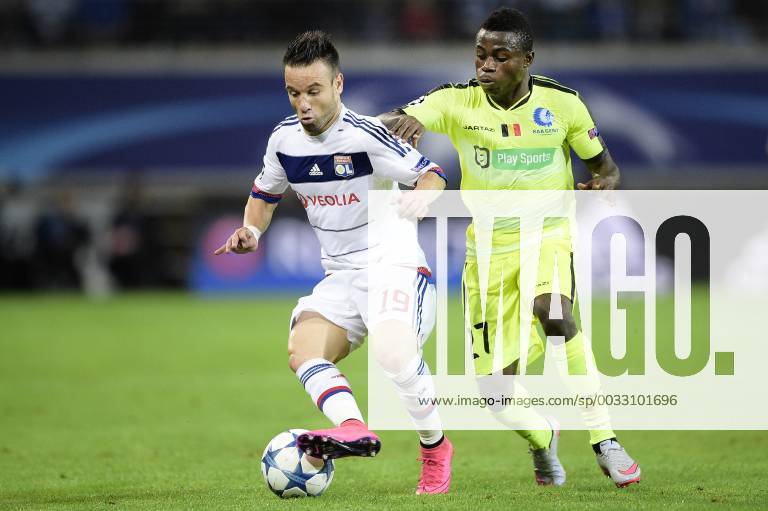 - GENT, BELGIUM: Lyon s Mathieu Valbuena and Gent s Moses Simon fight for the ball during the first game in the group stage of the Uefa Champions League competition, in group H, between Belgian first league soccer team KAA Gent and Olympique Lyon, in Gent, Wednesday 16 September 2015. YORICKxJANSENS x85281250x
