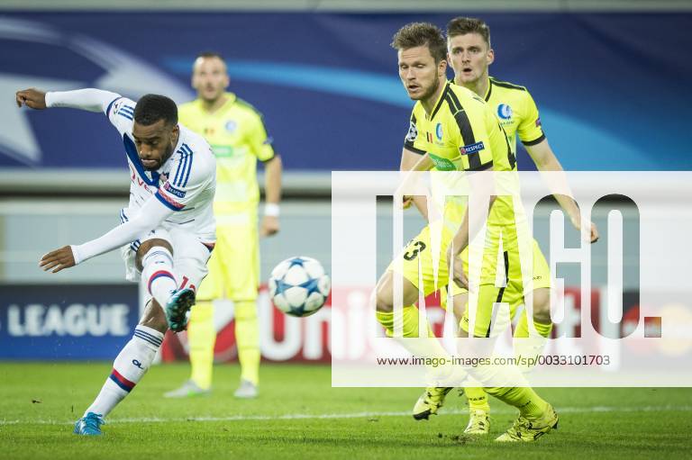- GENT, BELGIUM: Lyon s Alexandre Lacazette and Gent s Lasse Nielsen fight for the ball during the first game in the group stage of the Uefa Champions League competition, in group H, between Belgian first league soccer team KAA Gent and Olympique Lyon, in Gent, Wednesday 16 September 2015. JASPERxJACOBS x85281296x