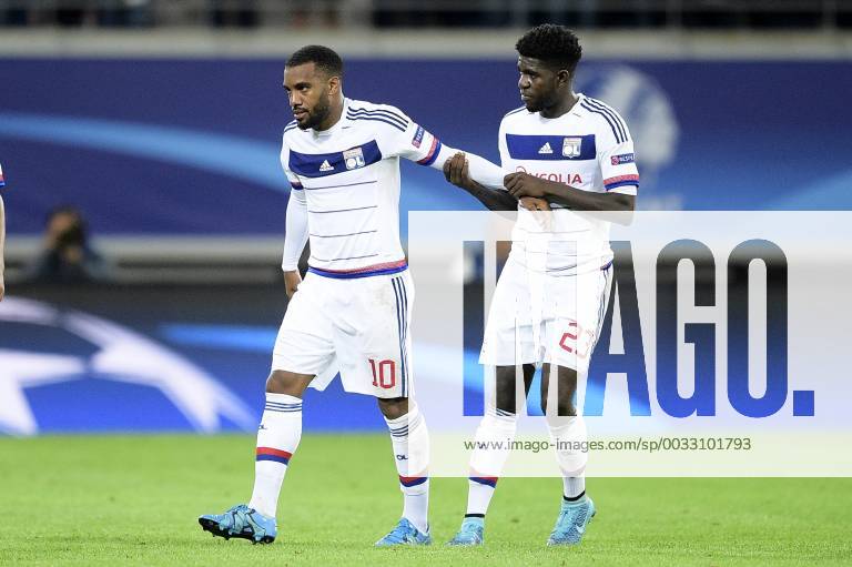 - GENT, BELGIUM: Lyon s Alexandre Lacazette and Lyon s Samuel Umtiti pictured after the first game in the group stage of the Uefa Champions League competition, in group H, between Belgian first league soccer team KAA Gent and Olympique Lyon, in Gent, Wednesday 16 September 2015. YORICKxJANSENS x85282432x