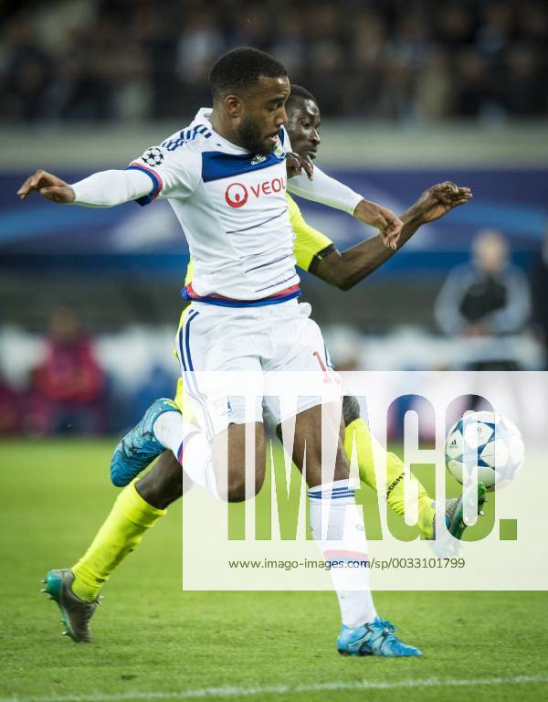 - GENT, BELGIUM: Lyon s Alexandre Lacazette and Gent s Nana Asare fight for the ball during the first game in the group stage of the Uefa Champions League competition, in group H, between Belgian first league soccer team KAA Gent and Olympique Lyon, in Gent, Wednesday 16 September 2015. JASPERxJACOBS x85282462x