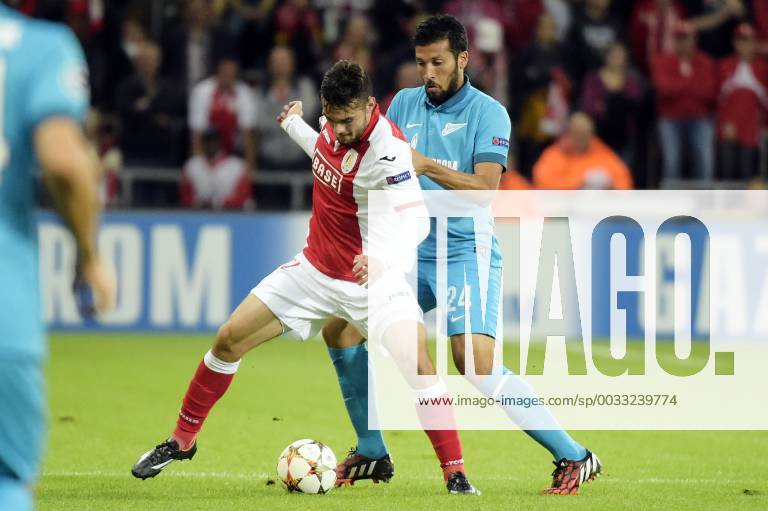 - LIEGE, BELGIUM: Standard s Tony Watt and Zenit s Ezequiel Garay fight for the ball during the first leg match between Belgian first division soccer team Standard de Liege and Russian team FC Zenit Saint Petersburg in the playoffs for the UEFA Champions League competition, Wednesday 20 August 2014, in Liege. YORICKxJANSENS x61262082x