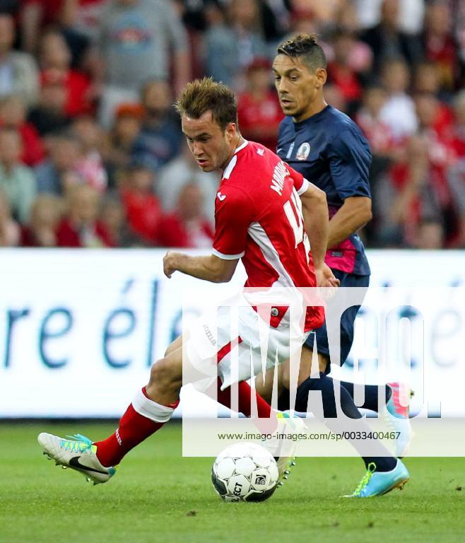 - LIEGE, BELGIUM: Standard d Francois Marquet and Xanthi s Nicolas Marin fight for the ball during the return leg game of Belgian First Division soccer team Standard de Liege and Greek team Skoda Xanthi in the third qualifying round of the UEFA Europa League in Liege, Thursday 08 August 2013. At first leg, Standard won 1-2. VIRGINIExLEFOUR x45119415x