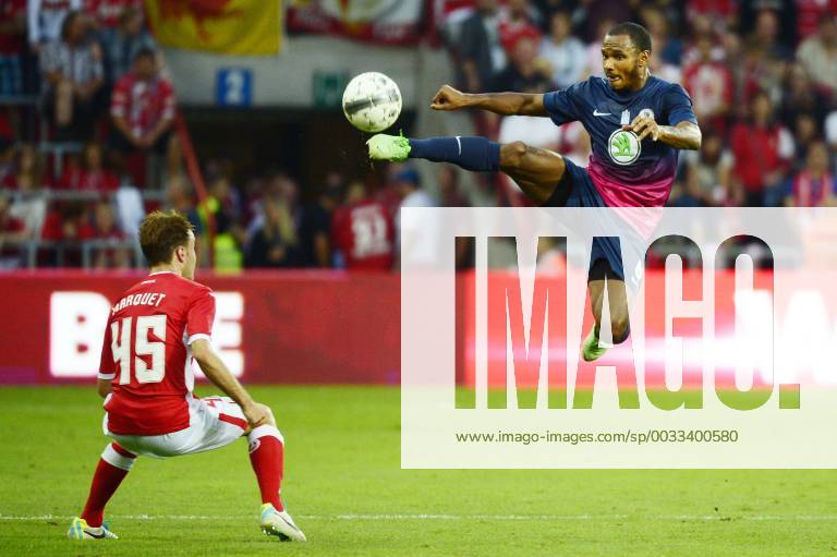 - LIEGE, BELGIUM: Standard d Francois Marquet and Xanthi s Julian Bobby De Guzman fight for the ball during the return leg game of Belgian First Division soccer team Standard de Liege and Greek team Skoda Xanthi in the third qualifying round of the UEFA Europa League in Liege, Thursday 08 August 2013. YORICKxJANSENS x45120159x