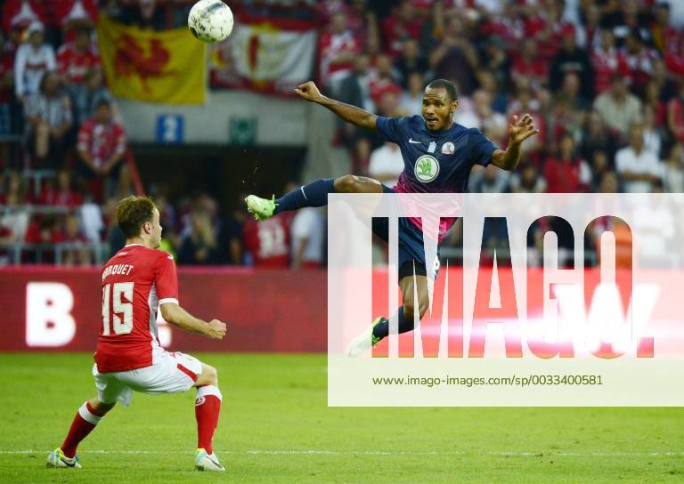 - LIEGE, BELGIUM: Standard d Francois Marquet and Xanthi s Julian Bobby De Guzman fight for the ball during the return leg game of Belgian First Division soccer team Standard de Liege and Greek team Skoda Xanthi in the third qualifying round of the UEFA Europa League in Liege, Thursday 08 August 2013. YORICKxJANSENS x45120164x