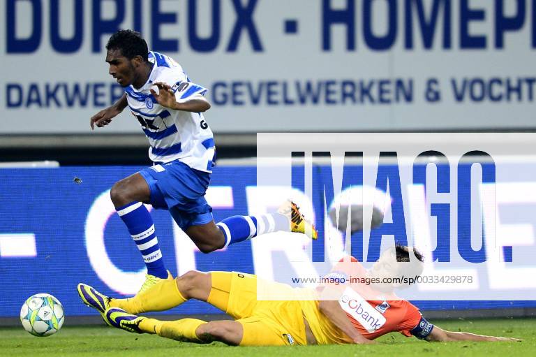 - GENT, BELGIUM: Gent s Renato Neto and Genk s Jelle Vossen fight for the ball during the Jupiler Pro League match between KAA Gent and KRC Genk, in Gent, Sunday 06 October 2013, on day 10 of the Belgian soccer championship. YORICKxJANSENS x47802146x