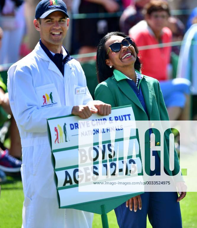 Former Secretary of State Condoleezza Rice laughs as she watches the Drive Chip & Putt National Finals at Augusta National Golf Club during Masters week on April 1, 2018 in Augusta, Georgia. AUG20180401314 KEVINxDIETSCH