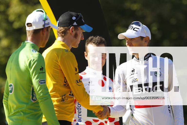 - PARIS, FRANCE: Slovakian Peter Sagan of Liquigas-Cannondale with the green jersey, British Bradley Wiggins of Sky Procycling Team with the yellow jersey, French Thomas Voeckler of Europcar with the white jersey with red dots (polka-dot) and US Tejay Van Garderen of BMC Racing Team with the white Jersey pictured on the podium after the 20th and last stage of the 99th edition of the Tour de France cycling race, 130km from Rambouillet to the Champs-Elysees, Paris, France, Sunday 22 July 2012. KRISTOFxVANxACCOM x36717673x