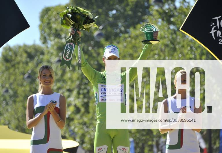 - PARIS, FRANCE: Slovakian Peter Sagan of Liquigas-Cannondale celebrates on the podium in the green jersey of leader in the sprint ranking after the 20th and last stage of the 99th edition of the Tour de France cycling race, 130km from Rambouillet to the Champs-Elysees, Paris, France, Sunday 22 July 2012. NICOLASxBOUVY x36717877x