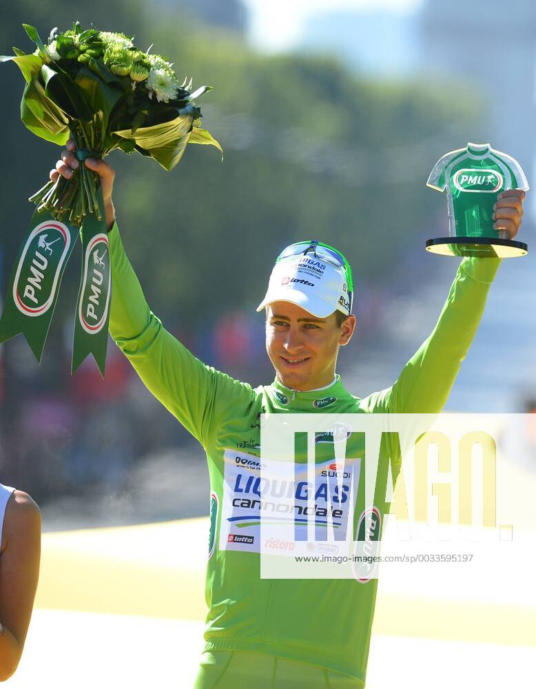 - PARIS, FRANCE: Slovakian Peter Sagan of Liquigas-Cannondale celebrates on the podium in the green jersey of leader in the sprint ranking after the 20th and last stage of the 99th edition of the Tour de France cycling race, 130km from Rambouillet to the Champs-Elysees, Paris, France, Sunday 22 July 2012. NICOLASxBOUVY x36718264x