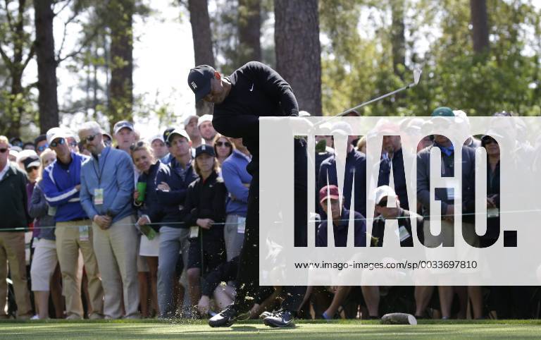Tiger Woods hits a tee shot on the 4th hole in the 1st round of the 2018 Masters Tournament at the Augusta National Golf Club in Augusta, Georgia, on April 5, 2018. AUG20180405120 JOHNxANGELILLO