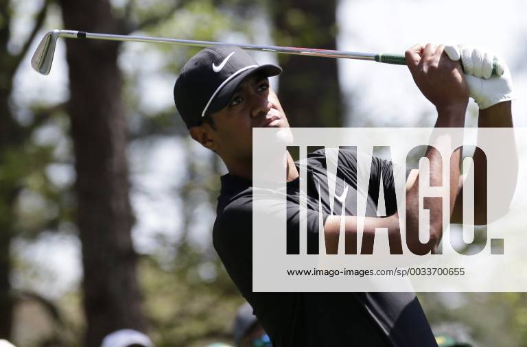 Tony Finau his tee shot on the 4th hole in the 1st round of the 2018 Masters Tournament at the Augusta National Golf Club in Augusta, Georgia, on April 5, 2018. AUG20180405142 JOHNxANGELILLO