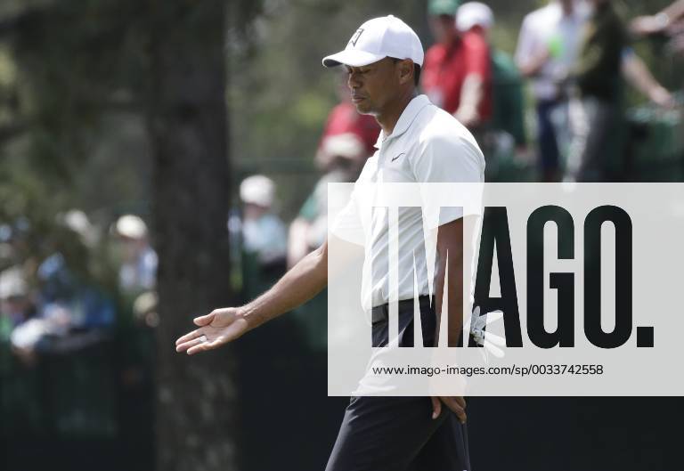 Tiger Woods reacts after a putt on the first hole in the 2nd round of the 2018 Masters Tournament at the Augusta National Golf Club in Augusta, Georgia, on April 6, 2018. AUG20180406126 JOHNxANGELILLO