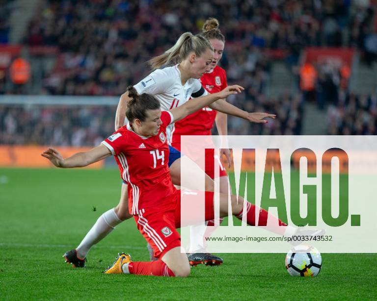 Hayley Ladd(14) of Wales tackles Toni Duggan(11) of England during the 2019 World Cup Qualification match between England Women and Wales Women at the St Mary s Stadium, Southampton, England on 6 April 2018.