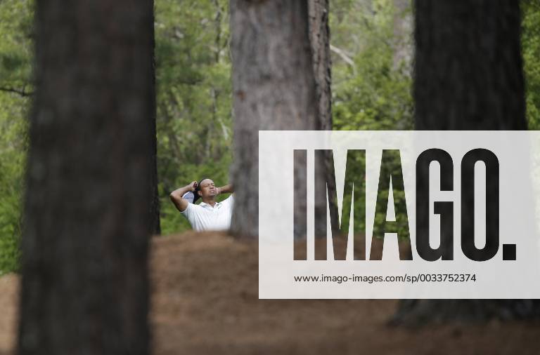 Tiger Woods reacts before hitting his approach shot to the 11th green in the 2nd round of the 2018 Masters Tournament at the Augusta National Golf Club in Augusta, Georgia, on April 6, 2018. AUG20180406141 JOHNxANGELILLO